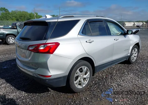 2018 Chevrolet Equinox Premier z USA, uszkodzony, nr VIN 2GNAXVEV8J6234355
